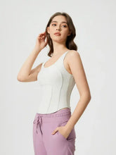 Millennia round neck active tank with chest pads, white racerback and lavender sweatpants