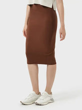 Millennia Slit Wrap Active Skirt in brown with white sneakers and beige top