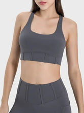 Charcoal gray square neck sports bra with ruched detailing and leggings