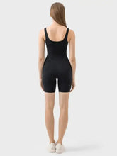 Millennia Wide Strap Active Romper in black seamless bodysuit with square neckline