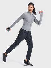 Millennia Zip-Up Long Sleeve Sports Jacket in grey with black pants