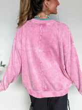 Pink mineral wash cross crew neck sweatshirt with white stitching details machine wash care instructions included