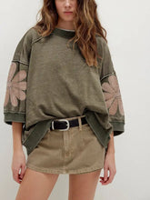 Olive green oversized mineral wash sweatshirt with pink floral embroidery on sleeves 3/4 sleeve loose top