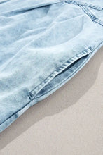 Light-wash mineral wash ruffle sleeve denim dress featuring soft faded texture and classic stitching details