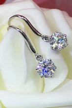 Boucles d'oreilles pendantes en argent sterling au design minimaliste avec des volutes de moissanite de 0,5 carat