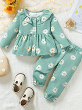 Toddler’s mint green daisy-print peplum blouse and pants set