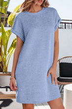 Mint green textured short sleeve mini dress with pockets and side slits