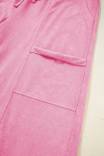 Calças cargo largas de veludo cotelê rosa com cintura ajustável por cordão e bolsos