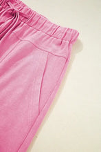 Calças jogger de veludo cotelê rosa com cintura elástica e cordão ajustável