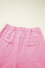 Calções de algodão cor-de-rosa com cintura elástica, cordão e bolsos