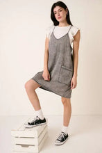 Gray denim mini cami dress with washed patch pockets and white ruffled short sleeves from mittoshop