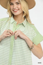 Light green and white mixed gingham short sleeve shirt with scalloped sleeves and button-up front design