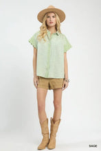 Light green and white mixed gingham short sleeve shirt with button-up front and relaxed fit for casual wear