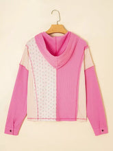 Mixed texture waffle floral patchwork hooded oversize pullover in vibrant pink and cream with slightly stretchy ribbed knit sleeves hood and care instructions