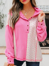 Pink and beige color-blocked henley top with floral patchwork front panel made from slightly stretchy waffle fabric