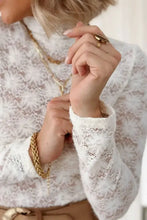 Mock neck long sleeve lace top with high collar and gold jewelry
