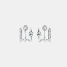 Sterling silver double-band hoop earrings with diamond prongs and pavé band