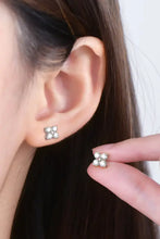 Sterling silver four-prong set cubic zirconia clover shape stud earrings