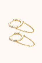 Sterling silver huggie earrings with small gold hoops, pavé diamonds, and chains