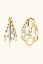 Pair of 18k gold-plated sterling silver layered earrings with interwoven bands and diamonds
