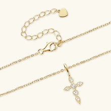 Elegant moissanite cross pendant necklace with gold chain and diamond accents