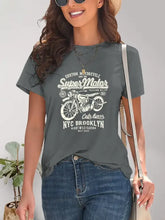 Women’s short-sleeve dark gray t-shirt with white motorcycle graphic