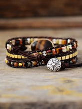 Brown leather multi-strand bracelet with Tiger’s Eye beads and silver accents