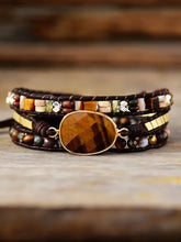 Multi-strand leather wrap bracelet with tiger’s eye gemstone and colorful beads