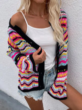 Multicolored crochet cardigan with chevron stripes and orange trim