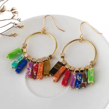 Gold hoop earrings with multicolored stone dangle fringe