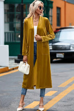 Mustard yellow velvet duster coat with long sleeve length and pockets