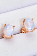 Natural moonstone stud earrings in rose gold oval claw setting