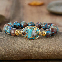 Natural stone beaded bracelet with turquoise inlay and gold accents
