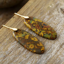 Natural stone copper dangle earrings with oval speckled stones