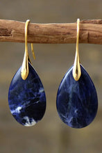 Natural stone teardrop earrings in blue sodalite with gold hooks
