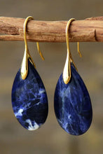 Natural stone teardrop earrings in blue sodalite with gold hooks