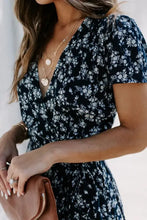Navy blue floral surplice short sleeve maxi dress with V-neckline