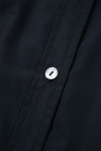 Navy blue puff sleeve mini shirt dress with black button-down accents