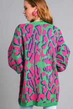 Stylish plus size neon green and pink abstract cardigan for easy layering