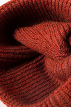 Close-up of NEWYORK Patch rib-knit cuffed beanie in dark red fuzzy texture