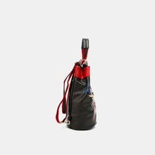 Nicole Lee USA flower pattern adjustable strap backpack bag in black leather with red top and multicolored embroidery