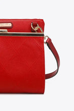 Nicole Lee USA red pebbled vegan leather handbag with gold clasp and chain strap