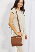 Nicole Lee USA pebbled vegan leather handbag with gold clasp