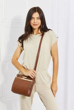 Nicole Lee USA pebbled vegan leather handbag with gold clasp