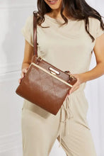 Nicole Lee USA pebbled vegan leather handbag with gold clasp