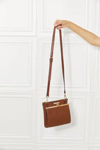 Nicole Lee USA pebbled vegan leather crossbody handbag with gold clasp
