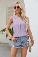 Lavender sleeveless top with notched neck curved and eyelet lace detailing featuring a curved hem eyelet design