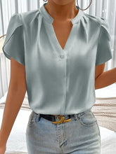 Light blue satin notched neckline petal sleeve blouse with short puffed sleeves and v-neckline