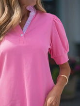 A vibrant pink notched short puff sleeve blouse with puffed sleeves and a striped collar for stylish wear