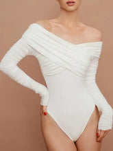 A white off-shoulder one-piece swimsuit with long ruched sleeves and a high-cut leg design featuring long sleeve style